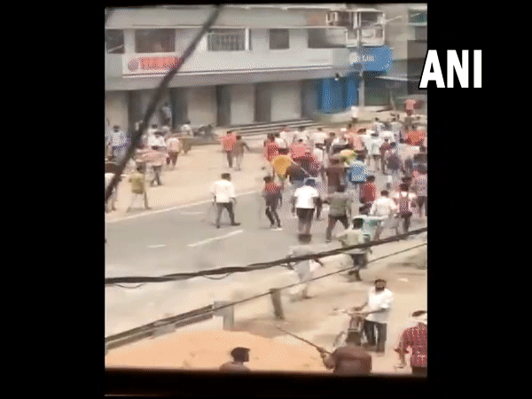 A train set ablaze as protests against Agnipath scheme escalate in Bihar (Photo/ANI)