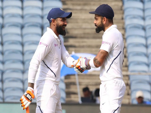 Ravindra Jadeja (L) and Virat Kohli (R) during their partnership on day two of Test in Pune on Friday. (Photo/BCCI Twitter) Ravindra Jadeja (L) and Virat Kohli (R) during their partnership on day two of Test in Pune on Friday. (Photo/BCCI Twitter)