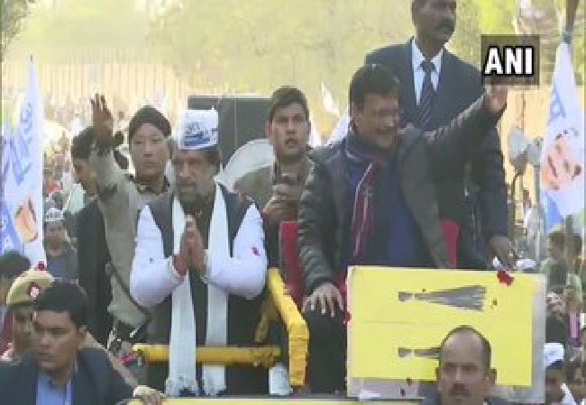 Delhi Chief Minister Arvind Kejriwal in a roadshow in Badarpur, Delhi on Friday. Delhi Chief Minister Arvind Kejriwal in a roadshow in Badarpur, Delhi on Friday.