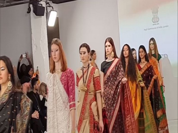 The most globally recognized Indian fashion item took centre stage on India Day - the Sari (Picture Courtesy: ANI)