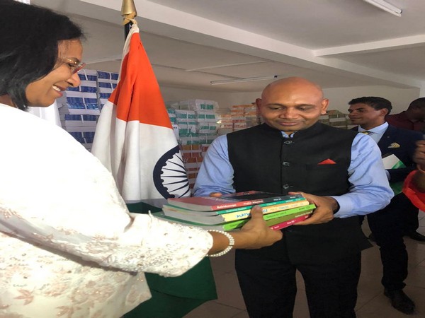 Indian ambassador Abhay Kumar hands over academic text books to Madagascar Minister Blanche Nirina Richard in Antananarivo on Tuesday