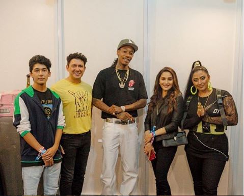 Madhuri Dixit Nene along with husband Dr Shriran Mene posing with rapper Wiz Khalifa and Raja Kumari (Image courtesy: Instagram) Madhuri Dixit Nene along with husband Dr Shriran Mene posing with rapper Wiz Khalifa and Raja Kumari (Image courtesy: Instagram)