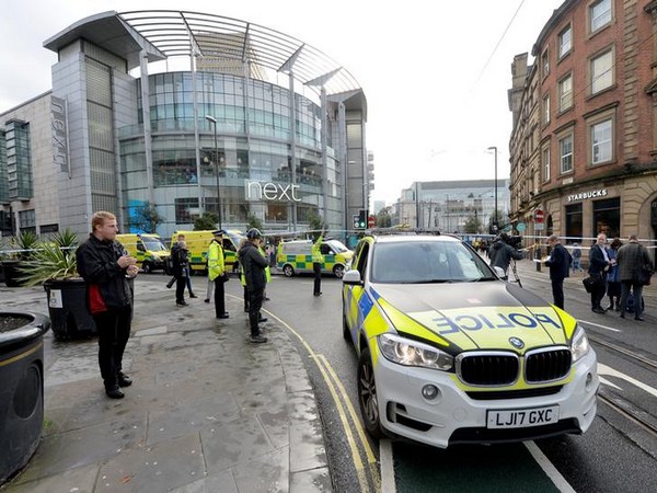 Police were seen outside a shopping mall in Manchester. Police were seen outside a shopping mall in Manchester.