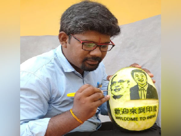 M Elanchezian-the artist who carved images of Prime Minister Narendra Modi and Chinese President Xi Jinping on watermelon. M Elanchezian-the artist who carved images of Prime Minister Narendra Modi and Chinese President Xi Jinping on watermelon.