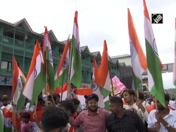 Independence Day 2022: People wave national flag at Lal Chowk in Srinagar