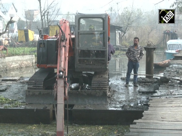 Dredging operation at old navigation channels in Dal Lake in Srinagar