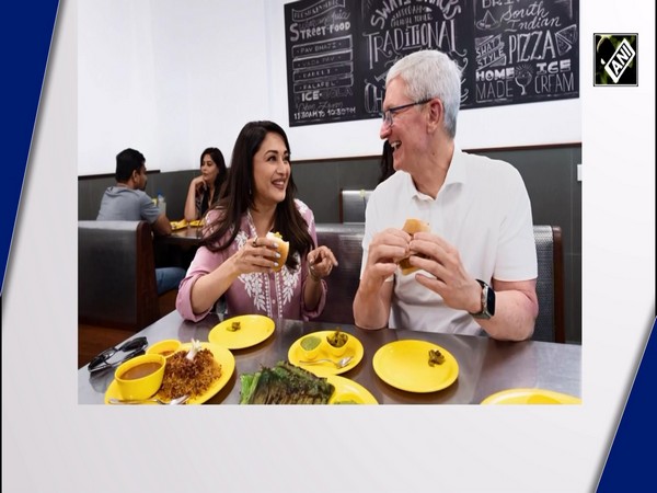 Madhuri Dixit gorges on ‘Vada Pav’ with Apple CEO Tim Cook