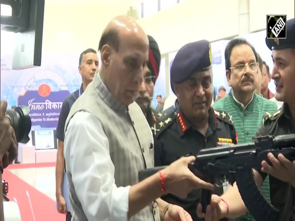 Army Commanders’ Conference: Rajnath Singh practises firing on small arms firing simulator