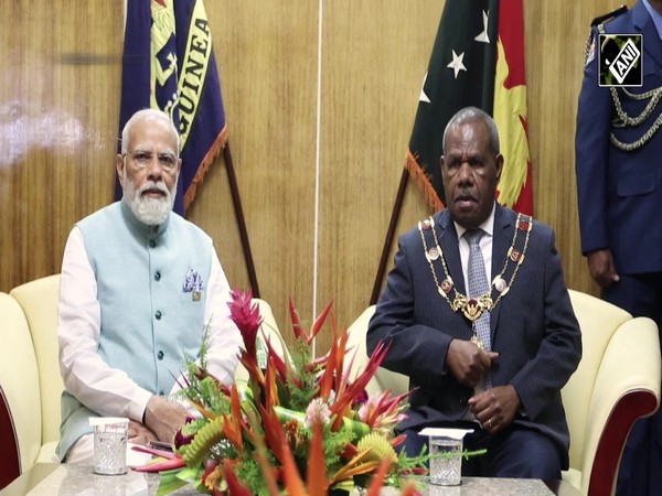 PM Modi meets Papua New Guinea Governor-General Sir Bob Dadae at Government House